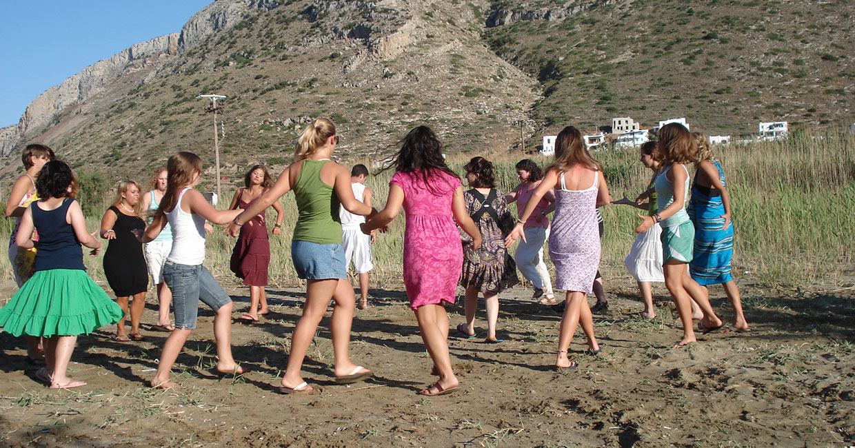 Greek folk dancing lessons for groups at Kamares beach